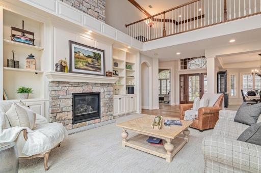 From the living room, enjoy a stunning view back toward the formal dining room, grand foyer and executive office—an open, flowing layout perfect for both everyday living and elegant entertaining.