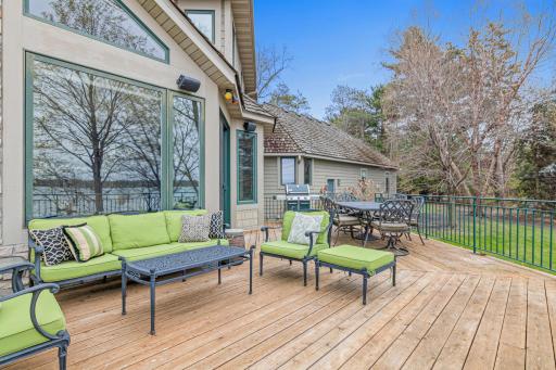 From the deck, take in the expansive park-like yard, offering lush greenery and plenty of space for outdoor activities and relaxation.