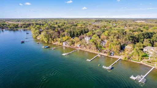 Ideal setting on Turtle Lake, west facing for sunsets, hard sand bottom, perfect drop off for water sports and more.