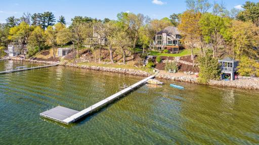 Hard sand bottom with lots of room to play in the water and a gentle drop for waterskiing off the dock.