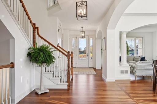 Entry with living room to the right and the office/main floor bedroom is to the left.
