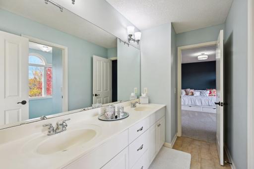 Jack and Jill bathroom connects two of the four upper level bathrooms