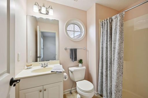 Bedroom 2 of 4 on the upper level features a private 3/4 en-suite.