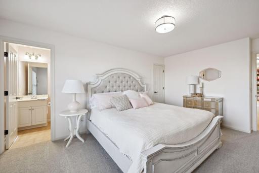 Bedroom 2 of 4 on the upper level has a walk in closet as well as private 3/4 bath.