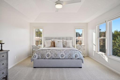 Main bedroom overlooks the expansive backyard.