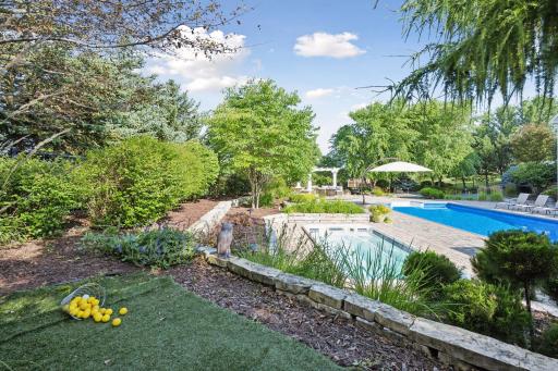 Chip over the pool to your putting green.