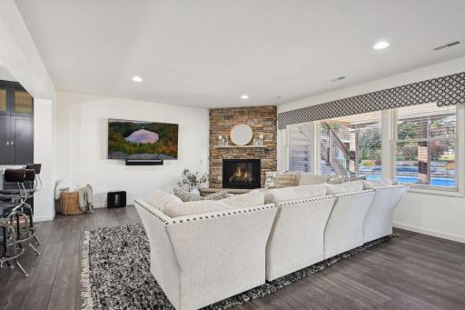 Family room with a gas fireplace for cozy winter evenings.
