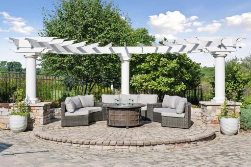 The yard is surround by beautiful landscaping and well thought out places to relax and take in the beauty.