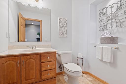 Half-bath with heated floors is next to LL bedroom - this is easily converted to three-quarter bathroom - R/I is just behind the towel wall.