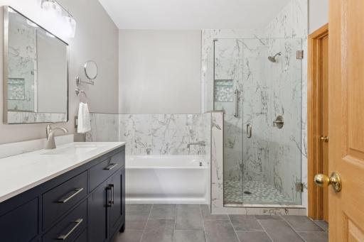 Private, fully updated primary bathroom - just lovely