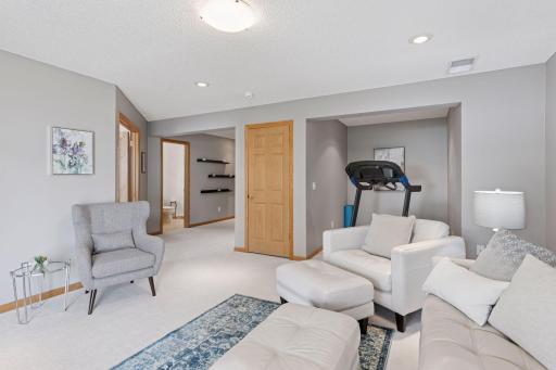 Large family room with nook for gym equipment