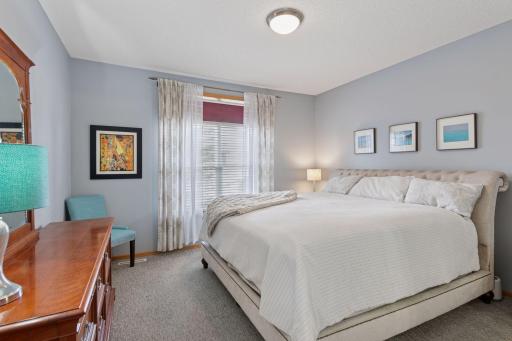 Main floor primary bedroom is a calming retreat