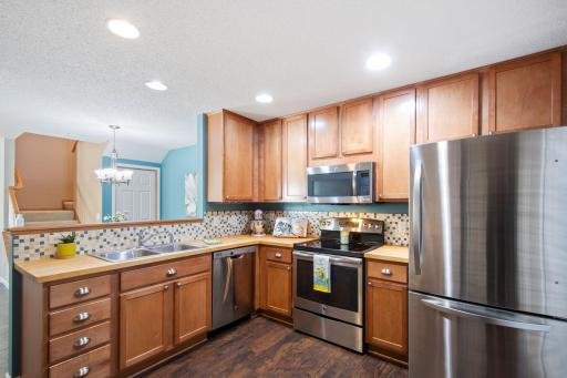 Kitchen features stainless steel appliances