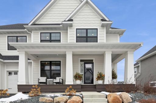 The maintenance free front porch welcomes you to enjoy some southern sunshine year round