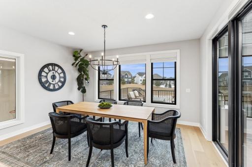 The black patio doors blend recreational and living spaces seamlessly.