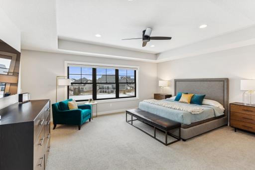 This primary luxurious retreat features a walk-in shower, two walk-in closets, and thoughtful amenities for comfort and convenience