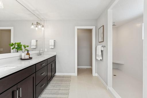The primary bath features create a harmonious blend of luxury and practicality, making your daily routine a delightful experience