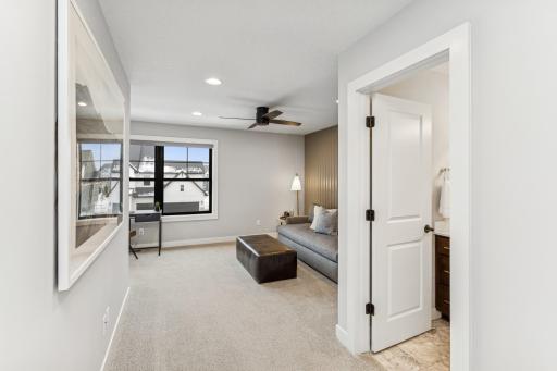 The third bedroom on the upper level is a true sanctuary, featuring a beautifully appointed ensuite bath that offers a serene and private escape