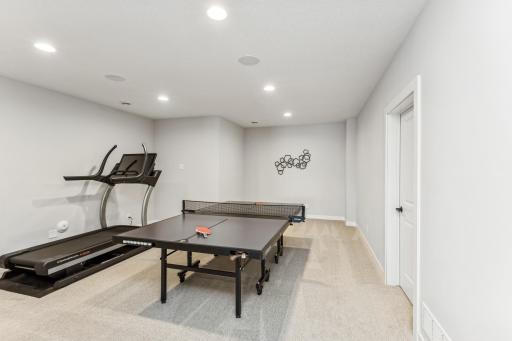 Whether youâre looking to break a sweat or engage in a fun game, this versatile space has you covered. Utility room and storage are located off of this room.