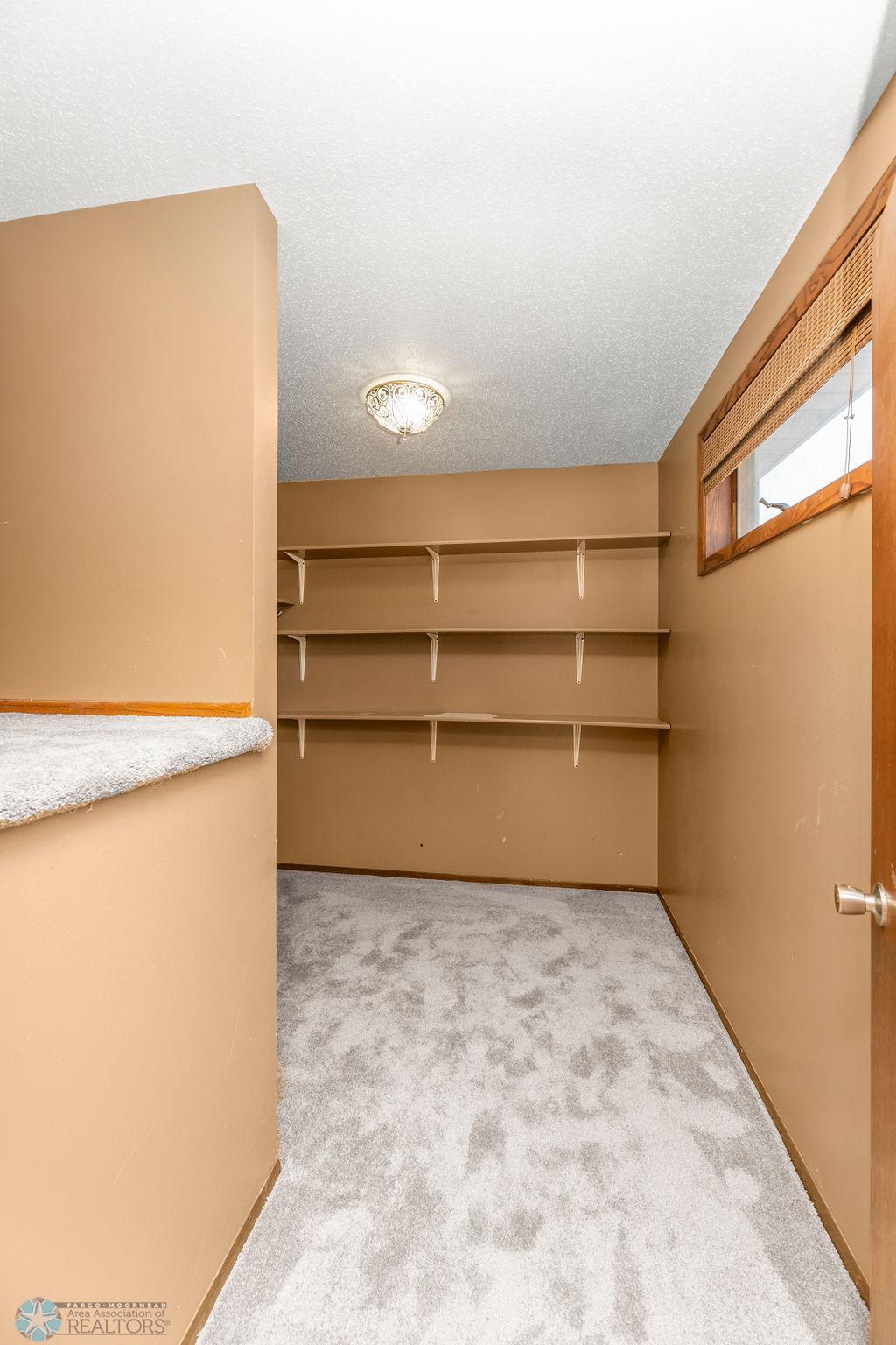 Master Bedroom's HUGE Walk-in Closet w/ Window