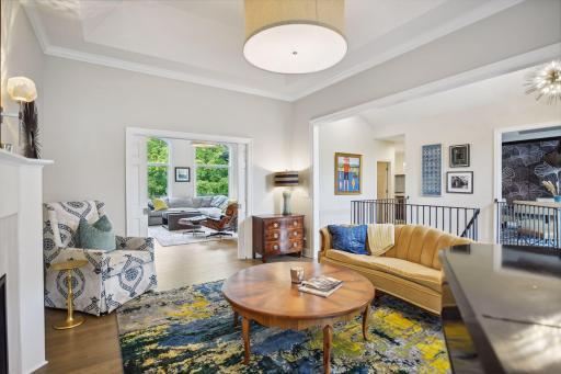 Front Living Room affords formal spaces while connecting to entire home