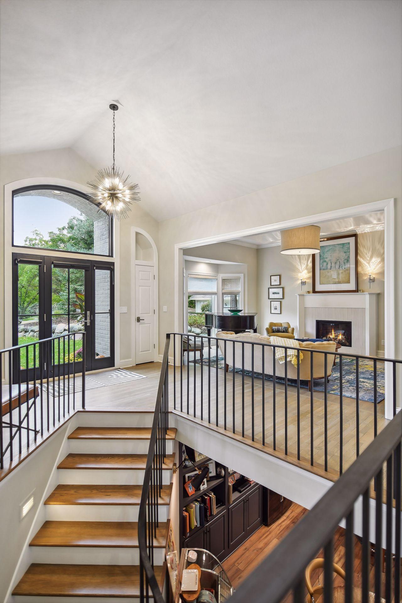 Bathed in sunlight, flowing floor plan with defined spaces