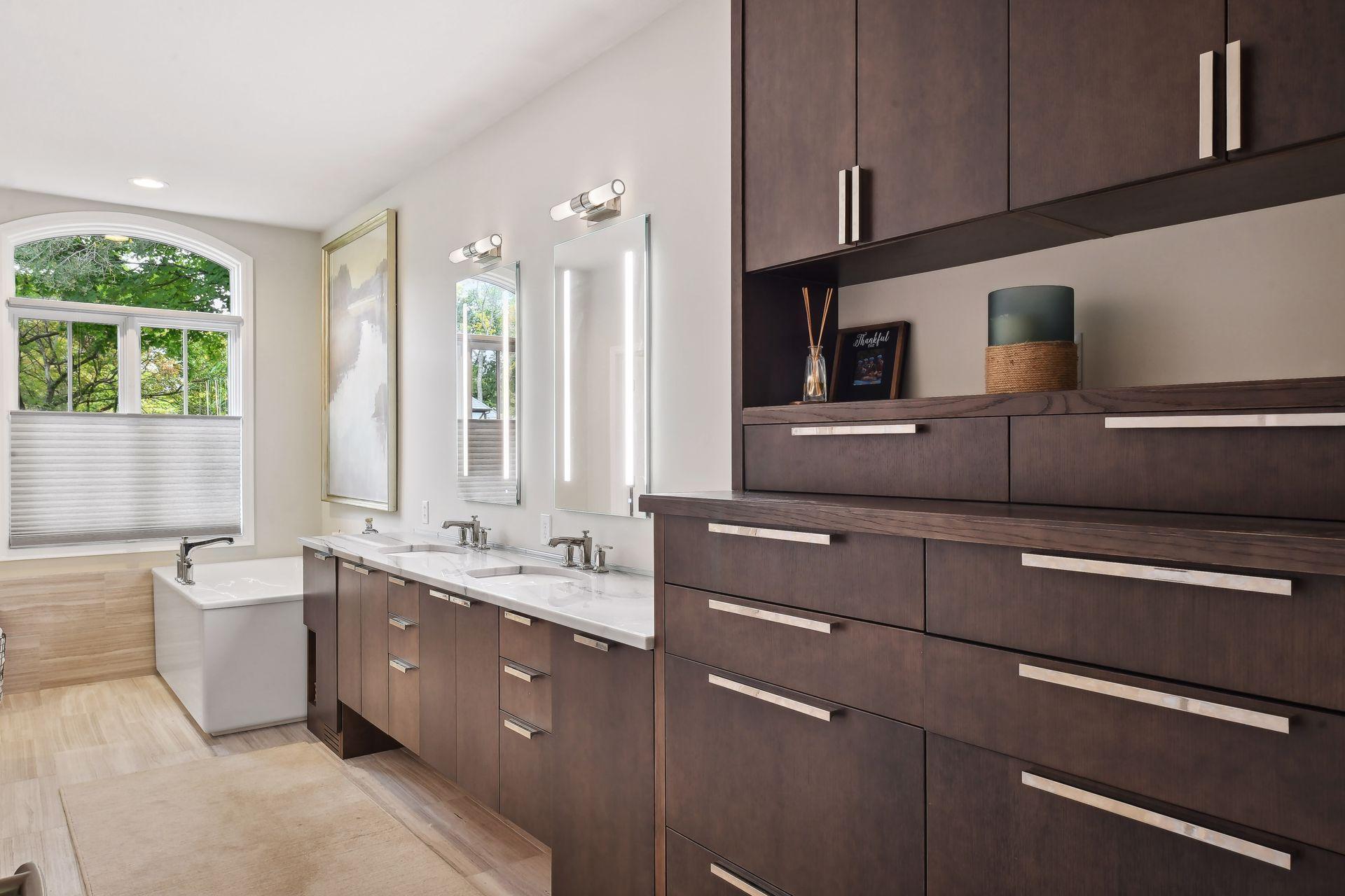 Remodeled primary with custom cabinets, heated marble floors