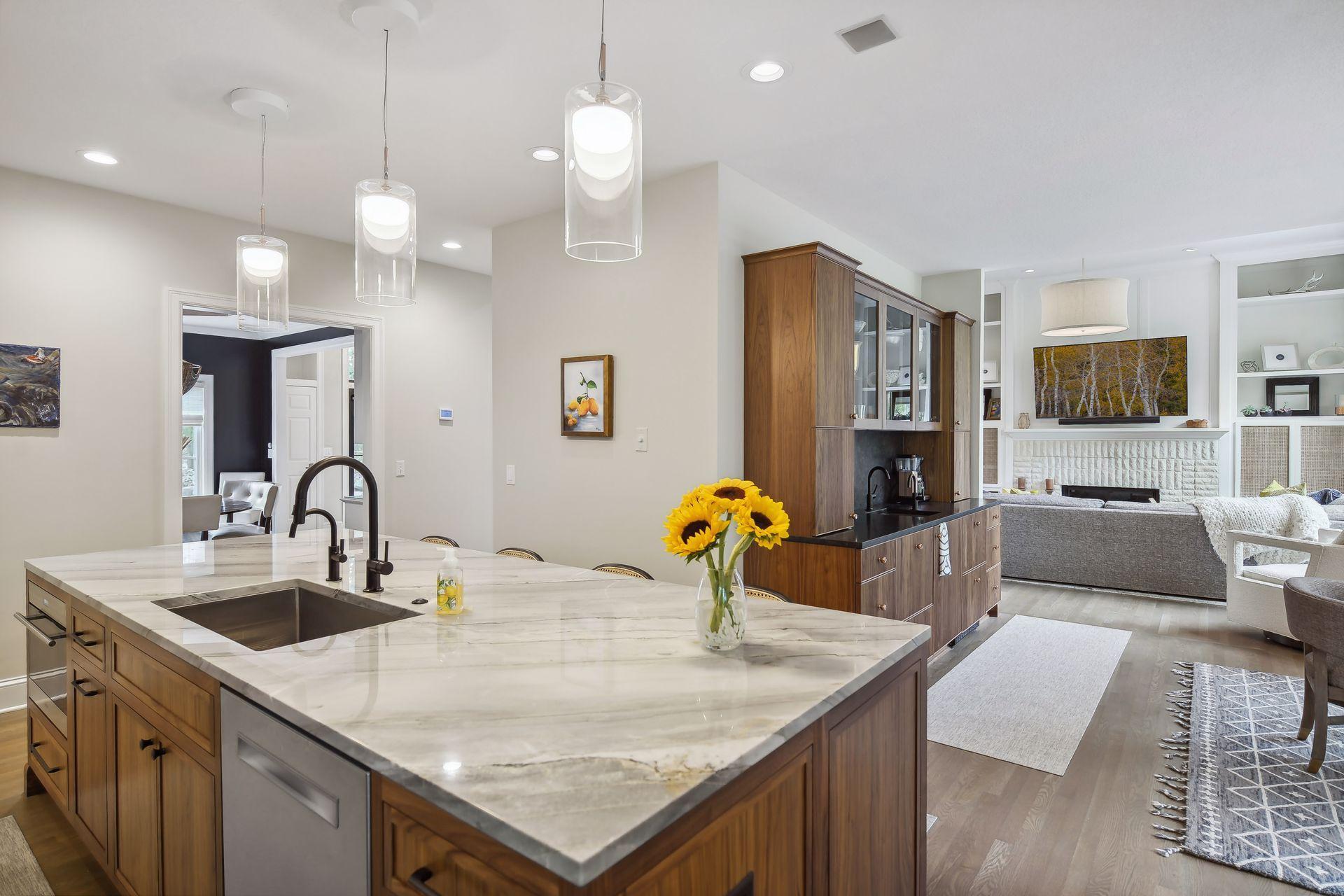 Custom walnut island - quartzite counters