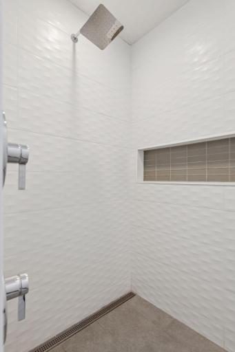Stunning walk-in shower in the primary bathroom