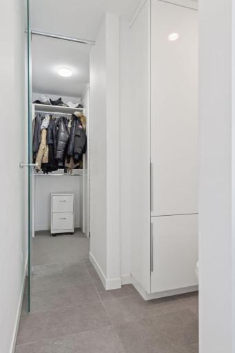 Primary bedroom suite also has a spacious walk-in closet