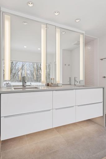 Lots of countertop and cabinet space in the primary bathroom
