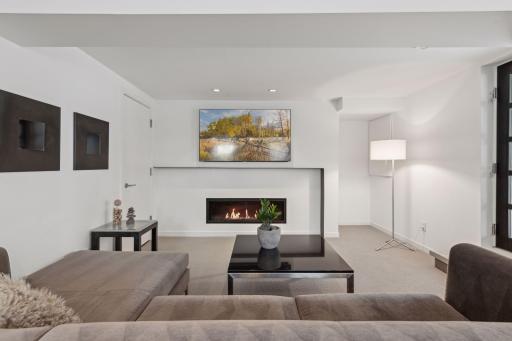 Inviting gas fireplace in the family room as well