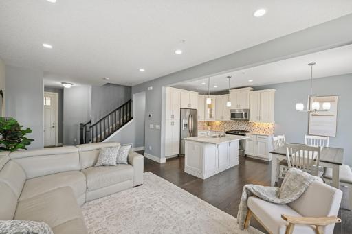 Spacious open floorplan with gleaming hardwood flooring on the main level.