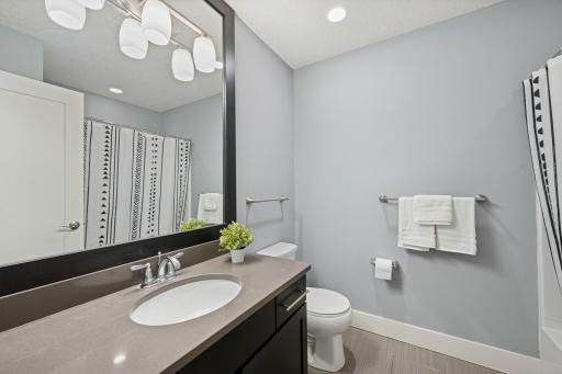 This full bathroom is for the second and third upstairs bedrooms.