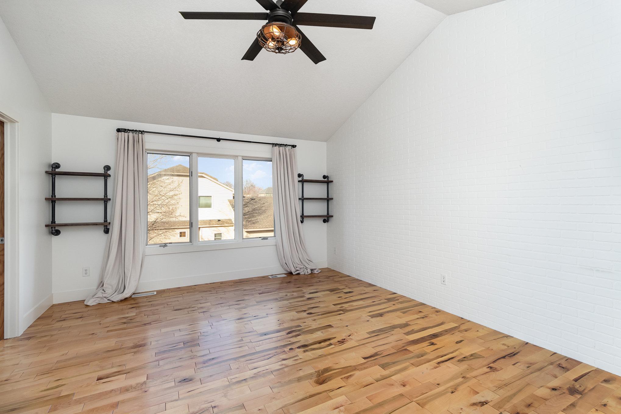 Large primary bedroom with dual walk in closets