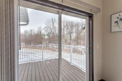 has a patio door to the maintenance free deck