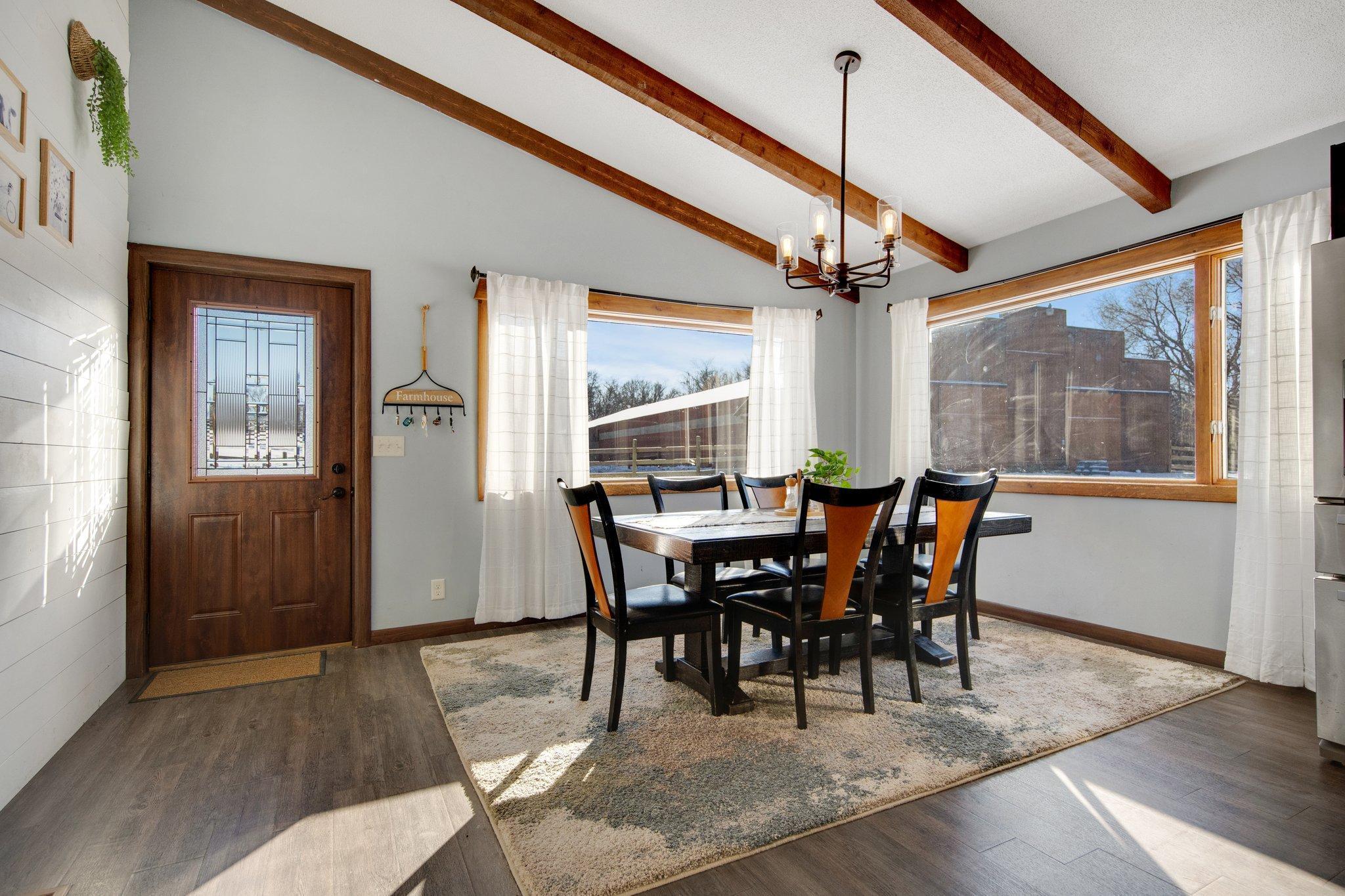 Large dining space off the kitchen. Complete with new flooring.