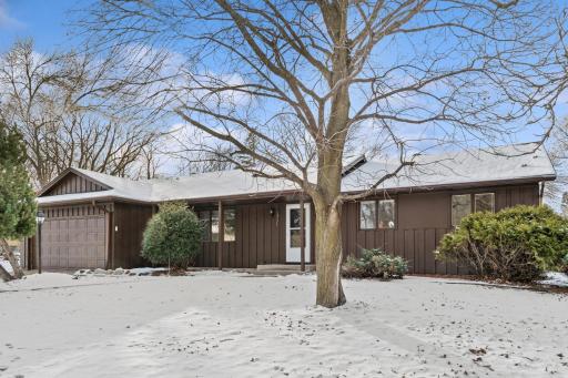 Welcome home to this spacious rambler style home refreshed and move in ready! You will love the location - just steps to several parks & trails, skating rinks, shopping, restaurants & easy access to major roadways for an easy commute!
