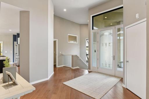 Vaulted and dramatic entry welcomes guests
