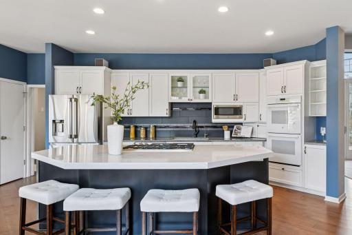 new quartz center island invites conversation while cooking
