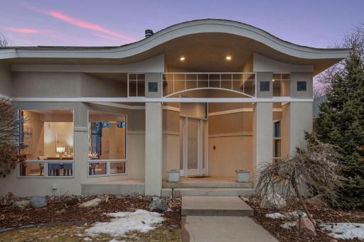 The dramatic eyebrow feature highlights the drama of this updated home