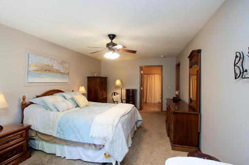 The primary bedroom features a walk-in closet and a private ensuite bathroom.