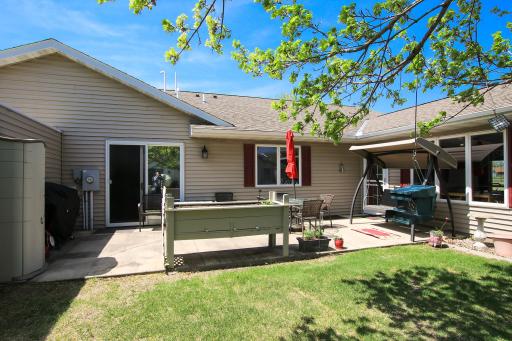 The backyard features an 11'x27' foot concrete patio.