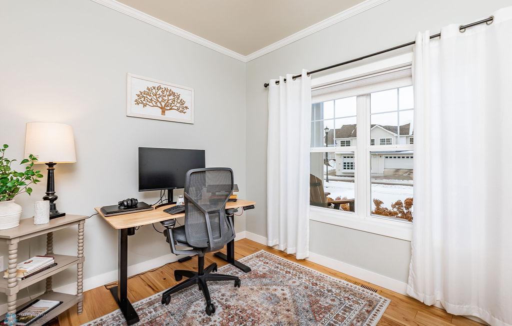 Large windows overlook the porch