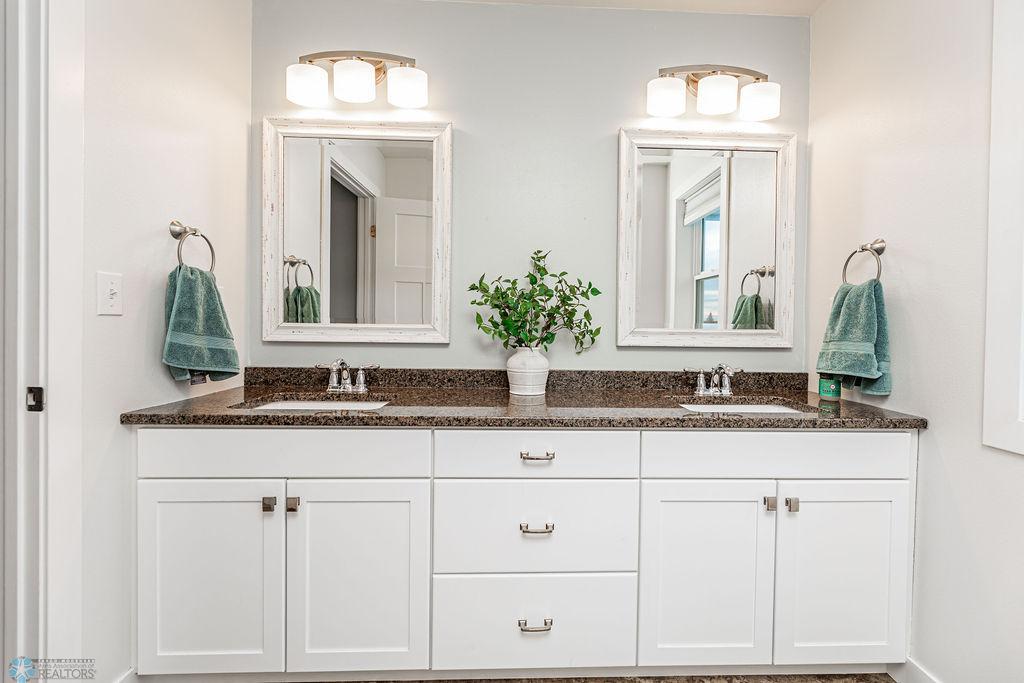 Double Sinks & Stone Countertops
