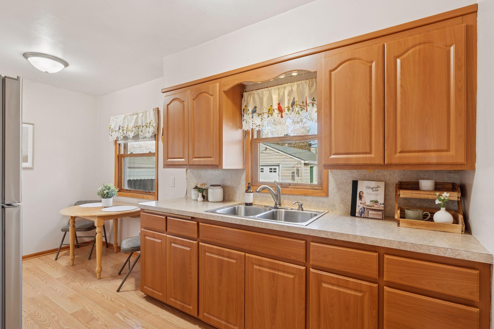 Kitchen overlooks the backyard, new stainless-steel refrigerator