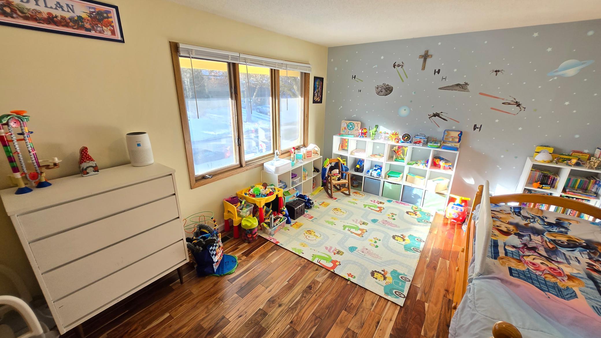 Bedroom #2 Oversized with beautiful hardwood flooring.