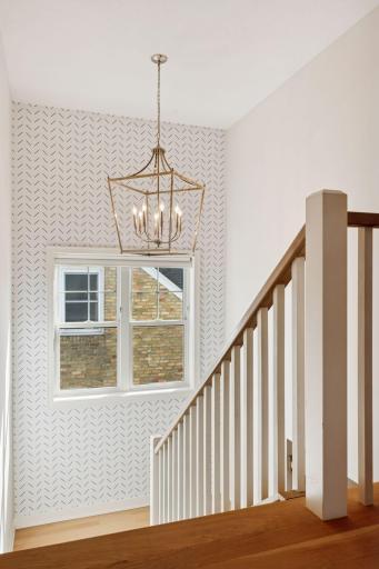 Beautifully Detailed Staircase with Custom Lighting