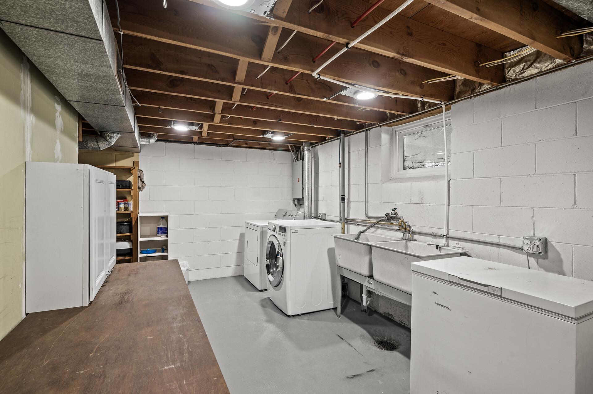 Laundry room with wash tub.