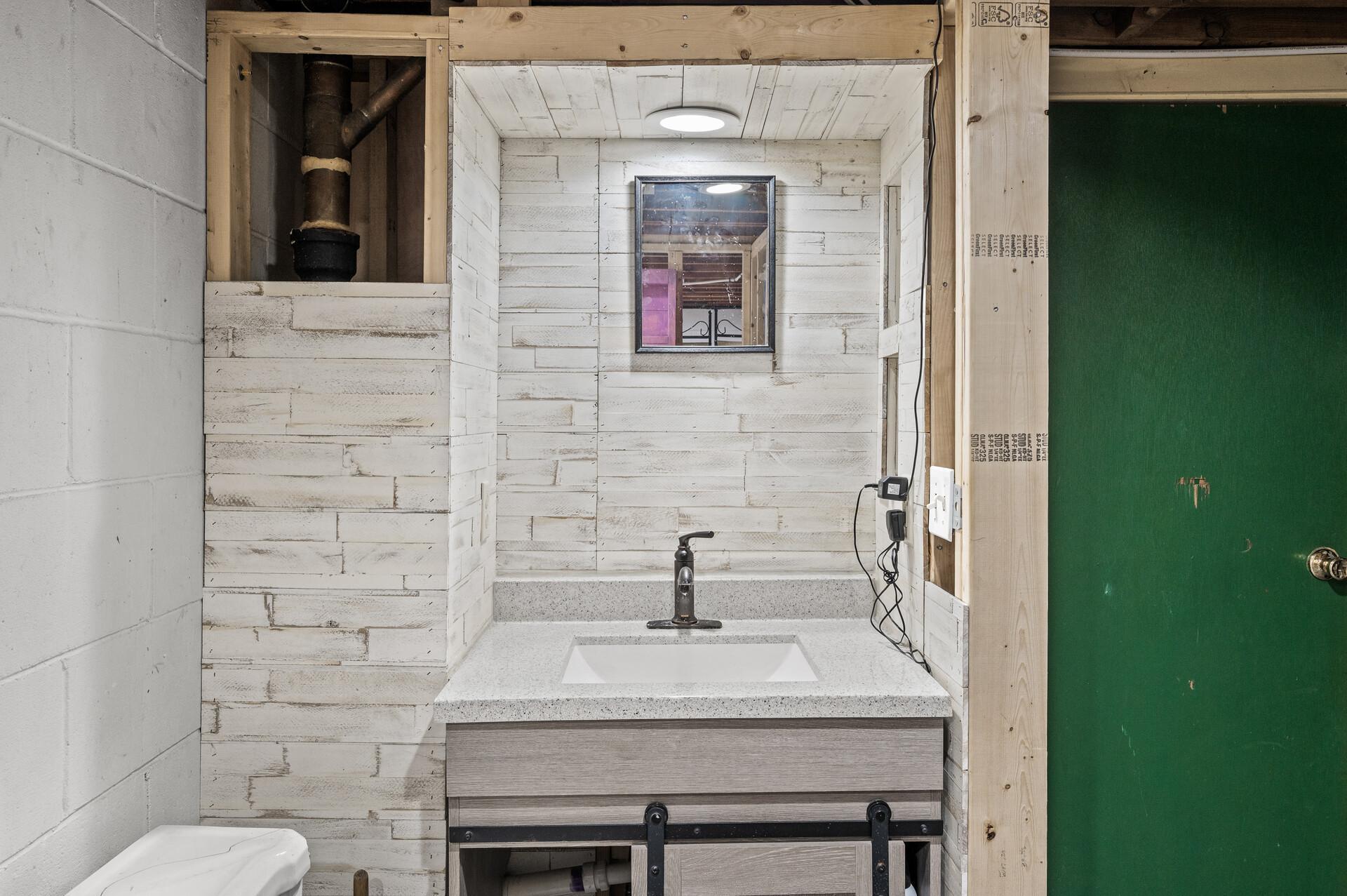 Half bath on lower level.